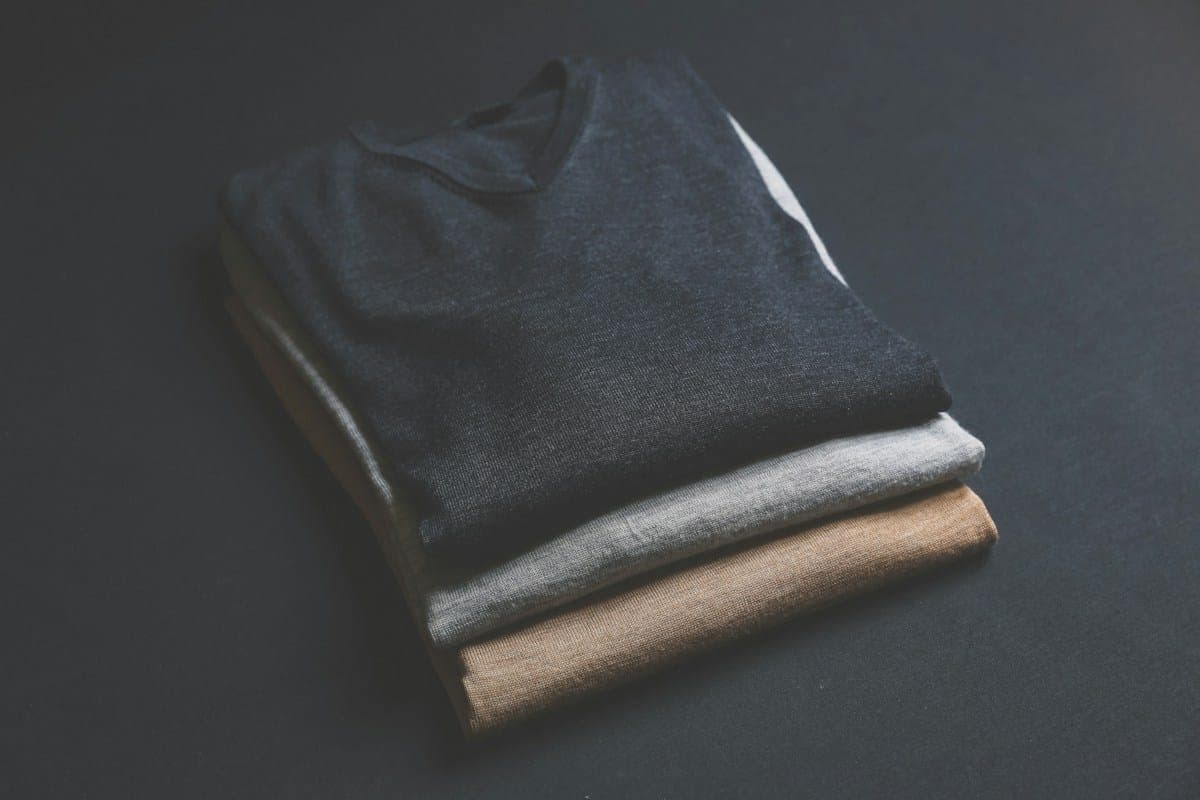 Three folded v-neck tees